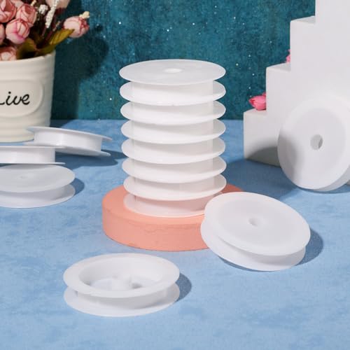 Craftdady 50Pcs Empty Plastic Wire Spools 2.64" in Diameter Thread Bobbins for Beading Wire Thread String - color: White, Plastic Wire Spools
